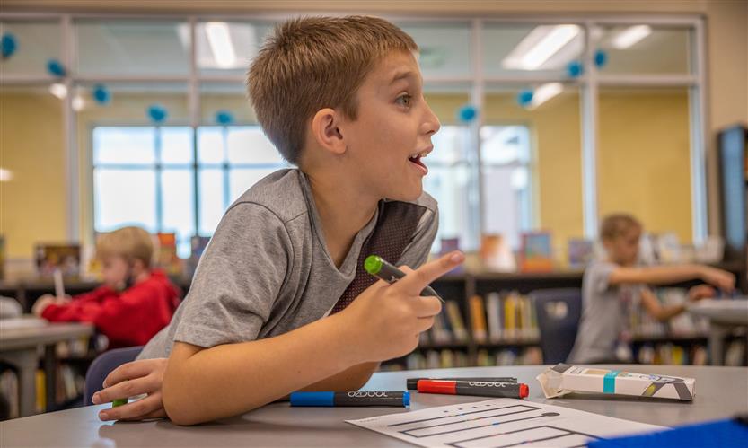 Students use robots in library